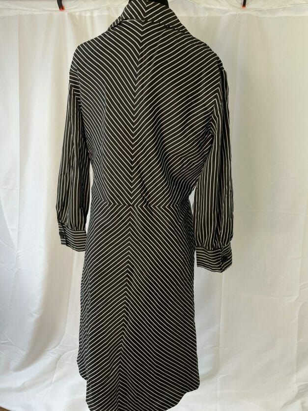 A Cute Classic Long Sleeve Vintage Pinstripe Dress on a mannequin.