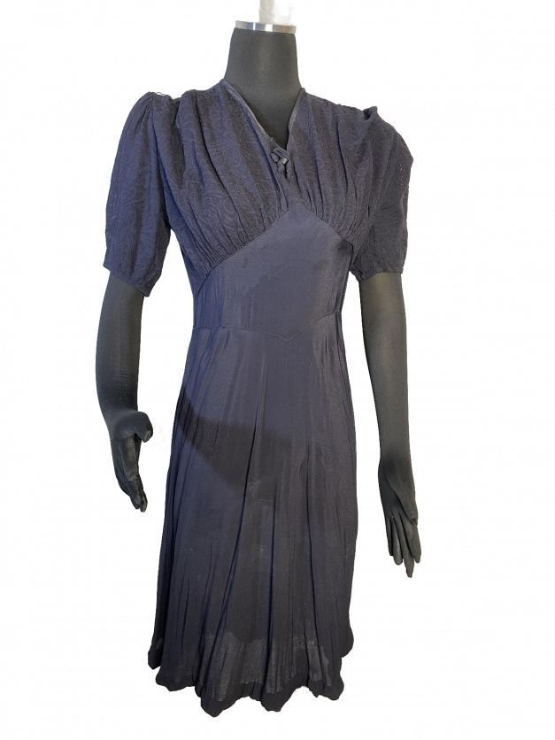 A Dainty Blue 1930s Vintage Dress on a vintage mannequin dummy.