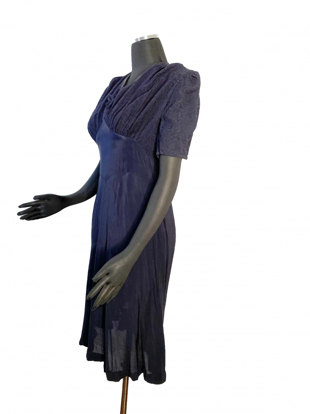 The "Dainty Blue 1930s Vintage Dress" gracefully adorns a dainty mannequin.