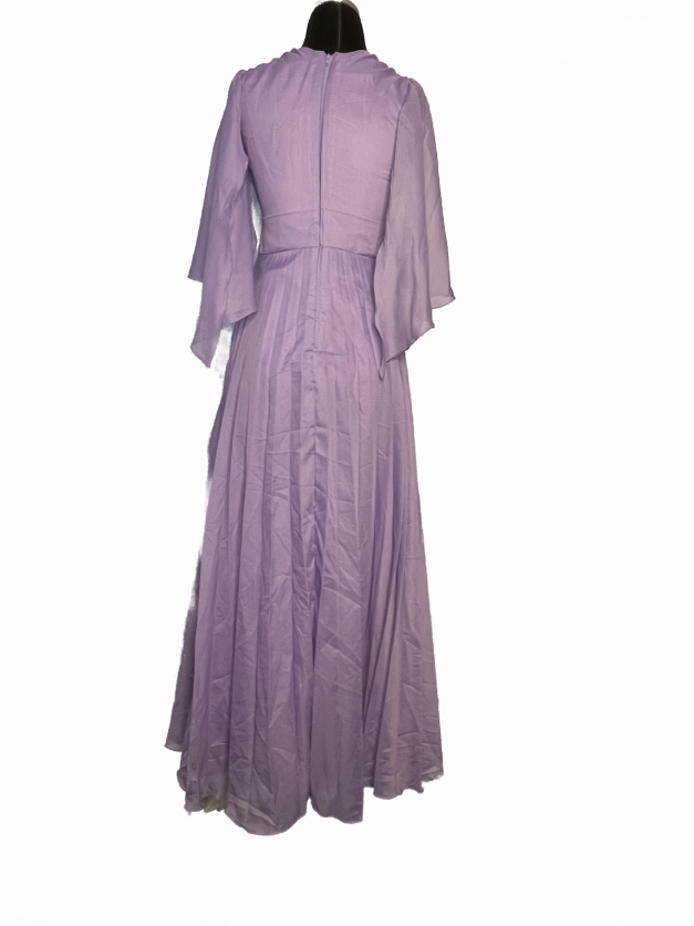 A Vintage 1970s Formal Maxi Dress - boho or hippie - on a mannequin with the Robilyse Made in Paris Label.