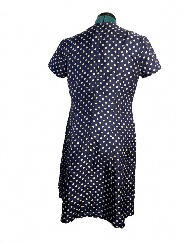 A Blue Polkadot vintage 1950s-60s Pinup-style dress - rare size XXL displayed on a mannequin for sale.