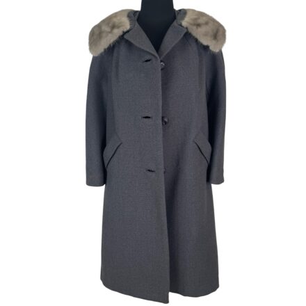 The Vintage 60s Marshall Field Company grey wool coat features a mink fur collar, mod swing silhouette, and classic style—ideal for any Mad Men-inspired wardrobe.