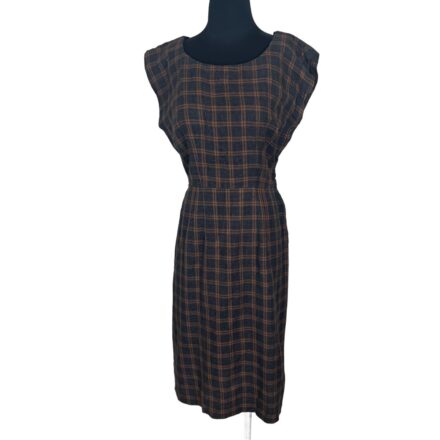 1950s RK Originals brown and black plaid wiggle dress, knee-length, sleeveless, velvet trim, on mannequin, mid-century mod style