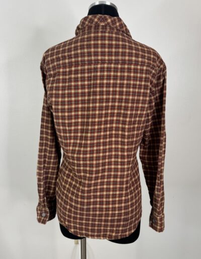 Brown plaid Levi's 90s women's flannel shirt with dagger collar, button-down back view on mannequin, retro grunge style.