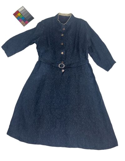 1940s navy blue floral brocade midi dress with mother of pearl buttons, matching belt, and WWII vintage style; color card top left.
