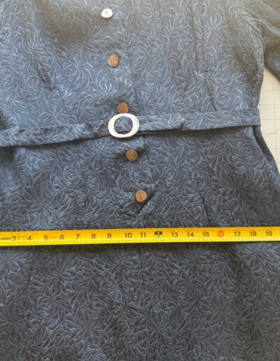 1940s handmade navy blue floral brocade midi dress with mother of pearl buttons, original belt, and 18-inch waist measured.