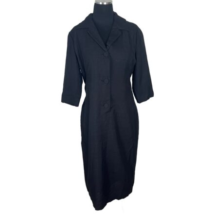 Vintage 1950s black slub silk midi dress, three-quarter sleeves, notched collar, three buttons, Dark Academia style on dress form.