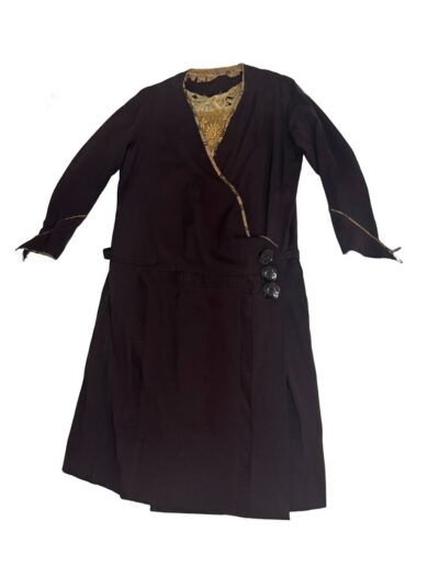 Plus size antique 1920s dark brown drop waist flapper dress with Art Deco embroidery, tan lace collar, and side waist buttons.