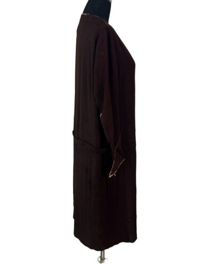 Plus size antique 1920s dark brown drop waist dress with loose sleeves and straight silhouette, flapper style, side view on mannequin.