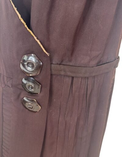 Rare plus size 1920s dark brown drop waist flapper dress with Art Deco embroidery, pleats, buttons, and subtle vintage wear.