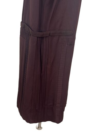 Rare Plus Size Antique 1920s dark brown drop waist dress with Art Deco embroidery, pleated skirt, belt, and pockets on mannequin.