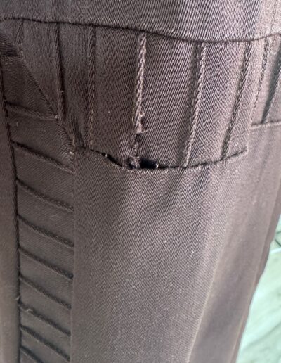 Rare plus size antique 1920s dark brown drop waist dress in XL/1X with pleated Art Deco detail, seam, and small hole by stitching.