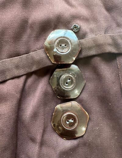 Rare Plus Size Antique 1920s Drop Waist Dress in dark brown fabric with three hexagonal buttons, Art Deco style, and matching belt.