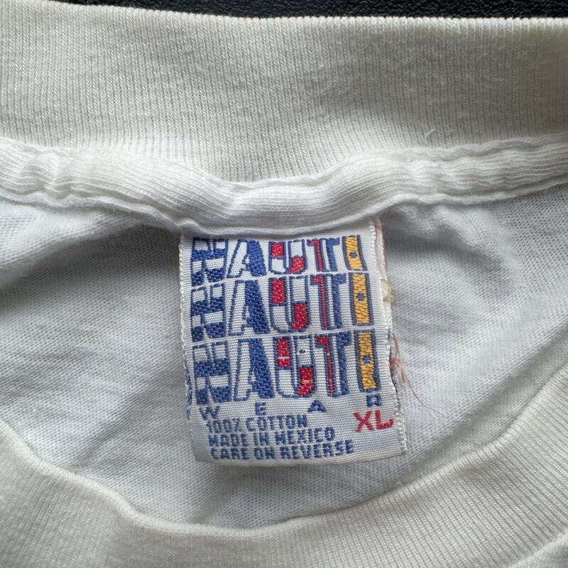 White tag inside vintage R.E.M. St. Louis 1989 concert shirt, colorful block letters, XL, 100 cotton, Made in Mexico.