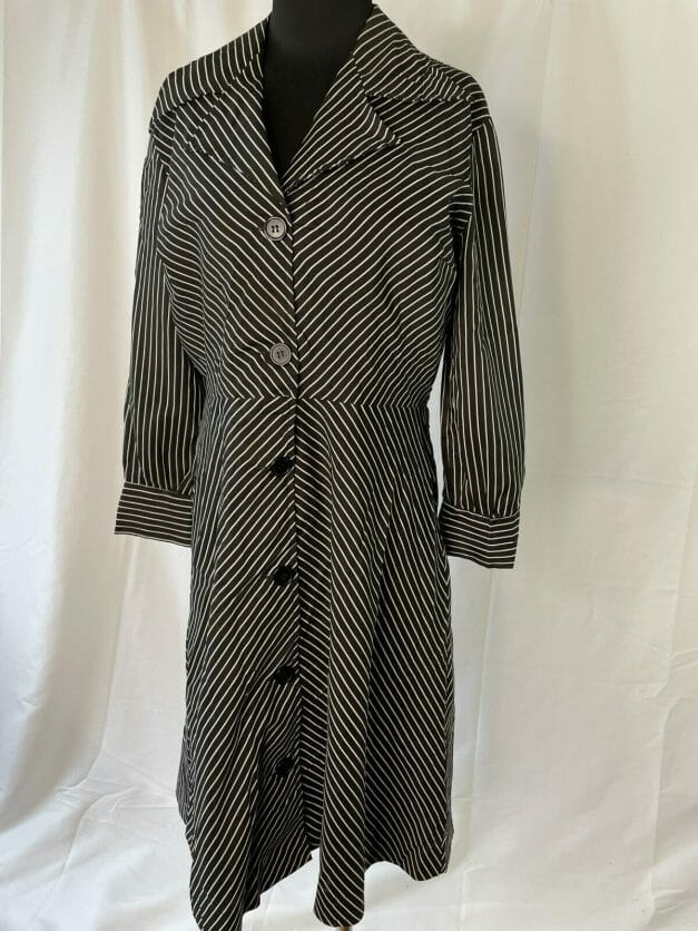 A Cute Classic Long Sleeve Vintage Pinstripe Dress on a mannequin.
