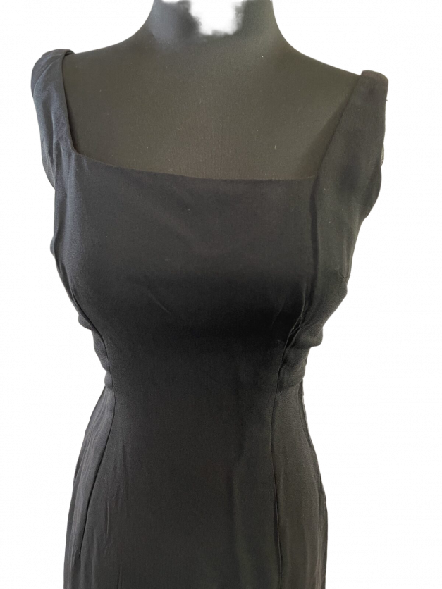 A sexy little black dress vintage 1950s sheath on a mannequin.