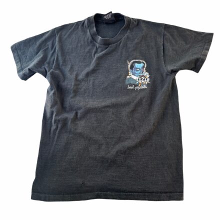 Rare 1992 Tesla “Local Psychotic” Pushead Tour Crew Shirt: black tee featuring a small blue skull and flower graphic above "look again" on the chest. Giant Tag L, made in USA.